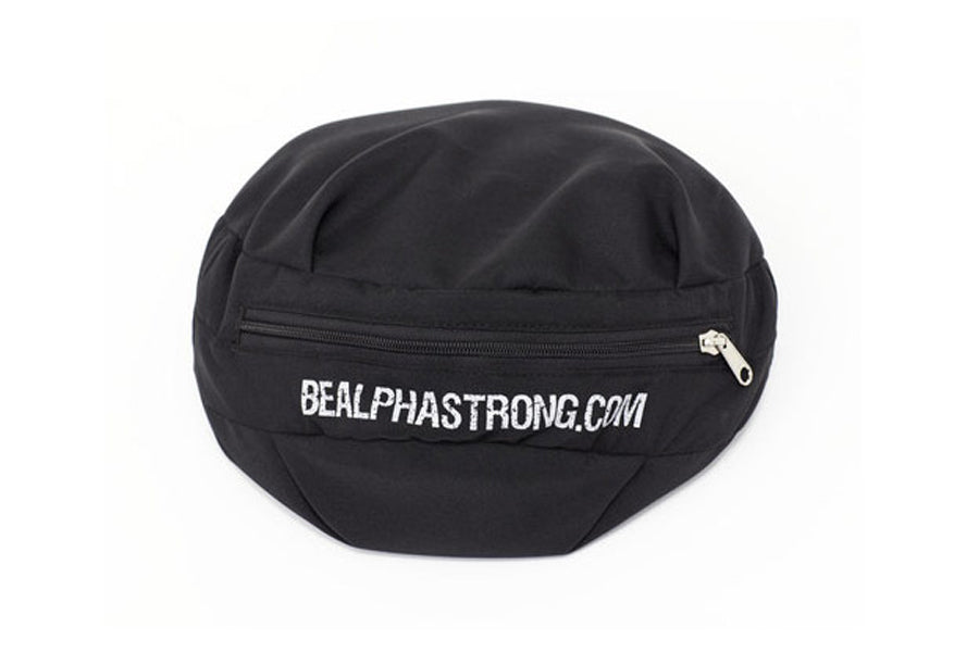 Black sand bag with zippered compartment and white "BEALPHSTRONG.COM" text on white background