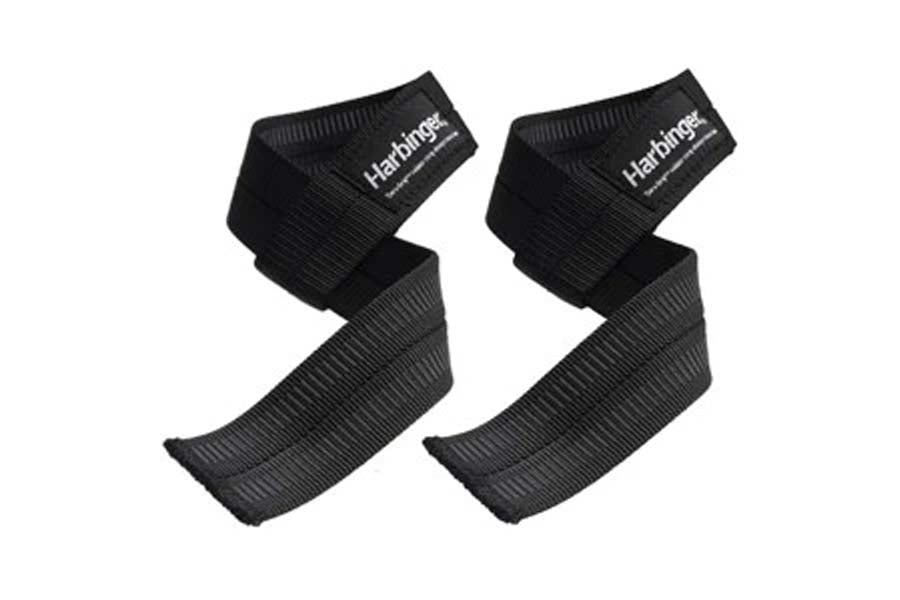 Pair of black Harbinger lifting straps with padded grip, flat lay on white background