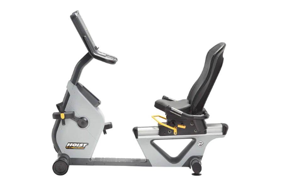 Hoist Lemond Series RT recumbent exercise bike with white frame, black handles and seat, yellow accents, on white background