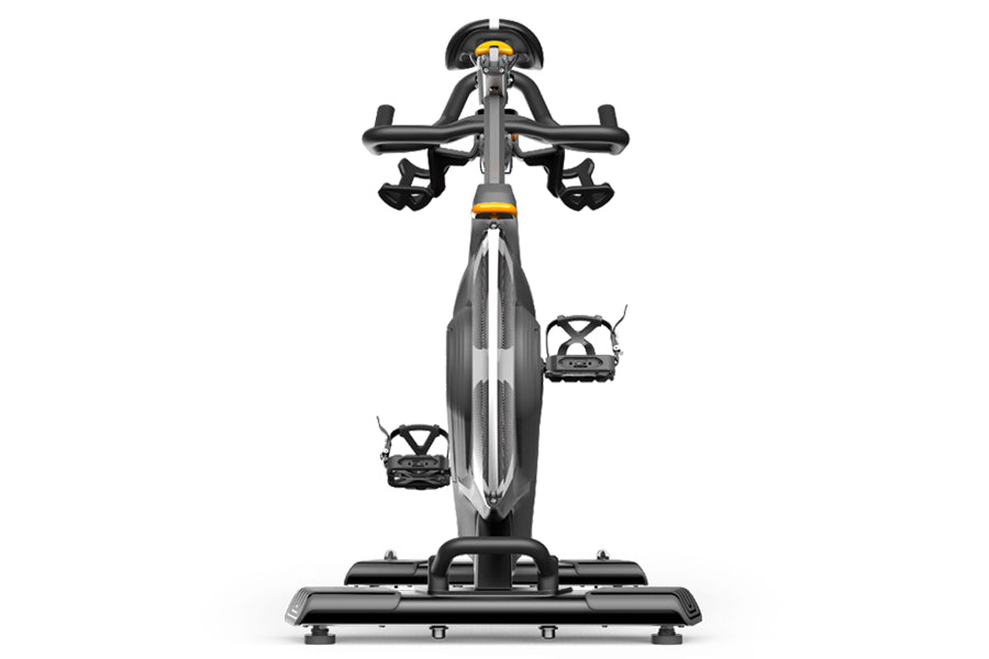Matrix CXM Indoor Training Cycle with black frame, drop handlebars, gray seat, and platform pedals on white background, front
