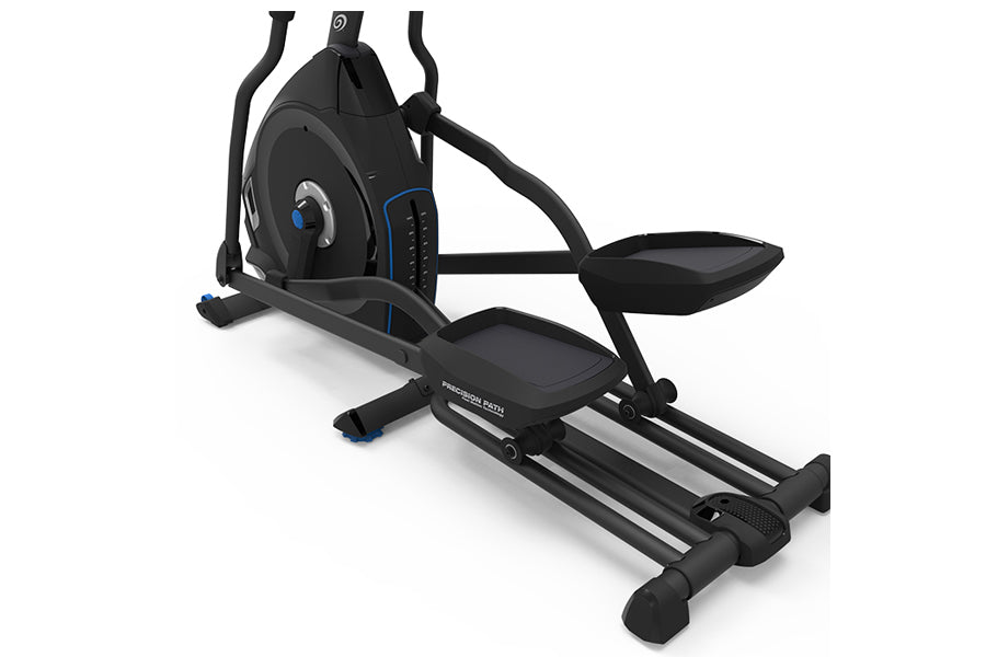 Black elliptical machine with blue accents, dual foot pedals, handle bars, and digital console on white background