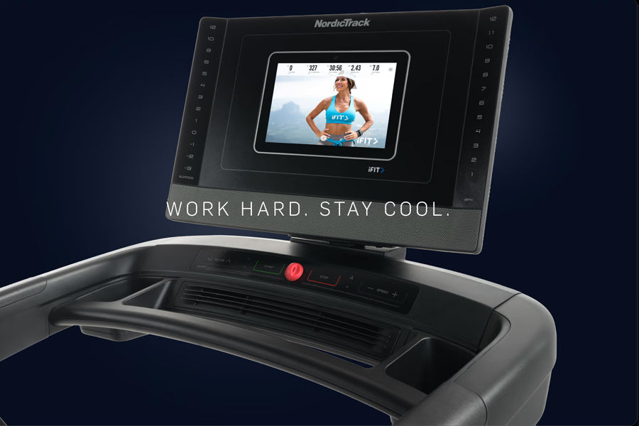 NordicTrack 1250 Commercial treadmill with black frame, red start button, and touchscreen display showing workout metrics and