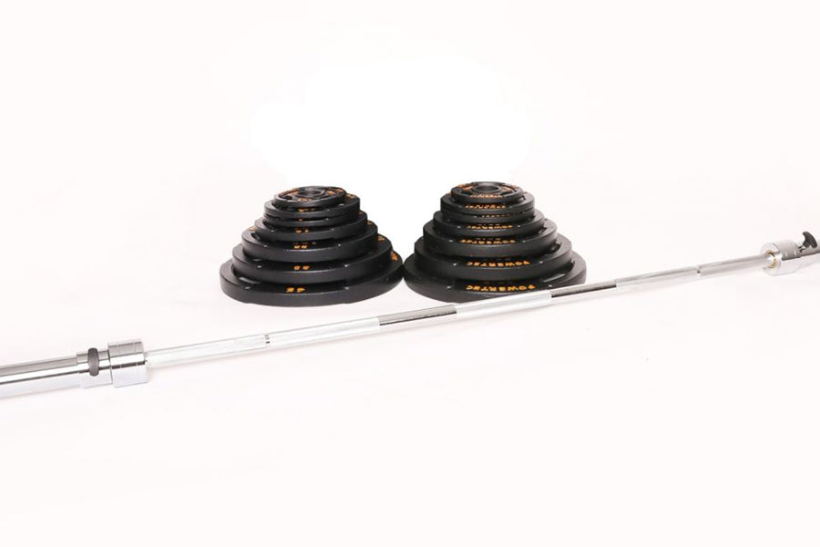 Powertec Olympic weight set with black rubber-coated plates and gold markings on chrome barbell, 300lbs total, on white backg