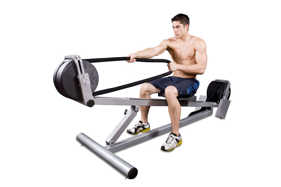 Ropeflex RX3300 Incline Rope Trainer with gray frame, black flywheel, and resistance rope, demonstrated by model on white bac