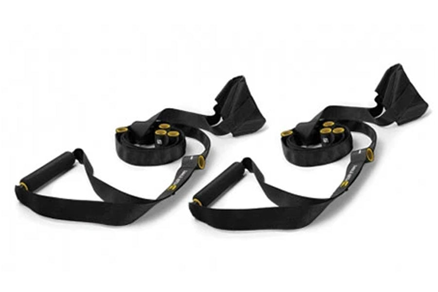 Black suspension trainer straps with yellow accents, featuring adjustable handles and anchor attachment, shown as pair on whi
