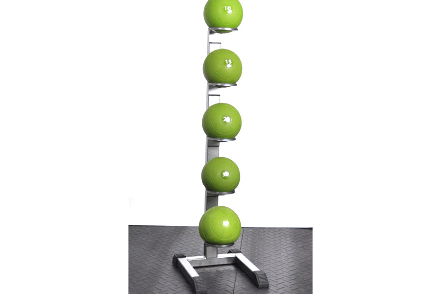 Vertical medicine ball storage rack with five lime green slam balls labeled 10, 15, 20, 25, and 30 pounds on metal post with