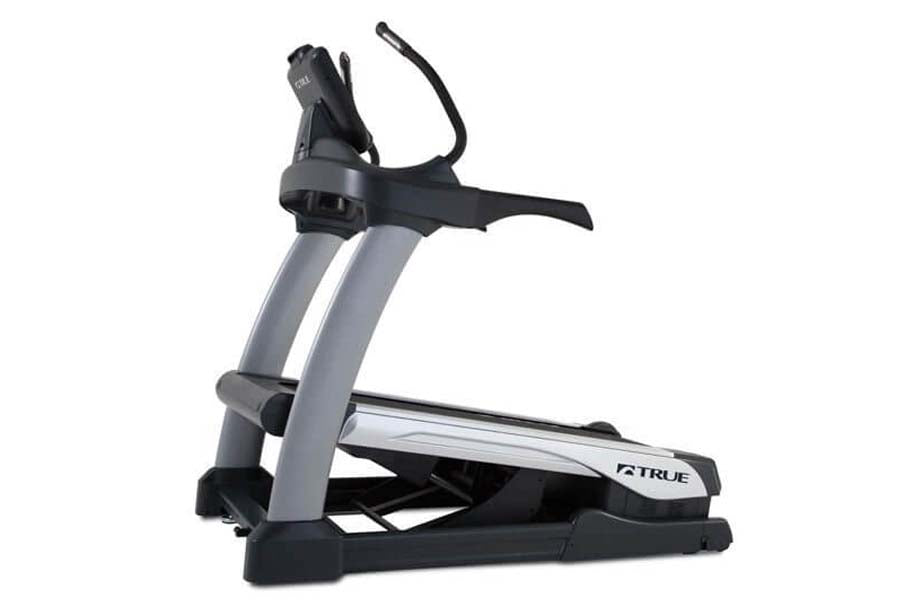 TRUE Alpine Runner Treadmill with gray and black frame, dual handles, and digital display on white background