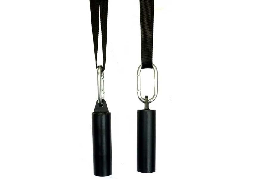 Pair of black cylindrical tube grip attachments with silver carabiners and black nylon straps on white background