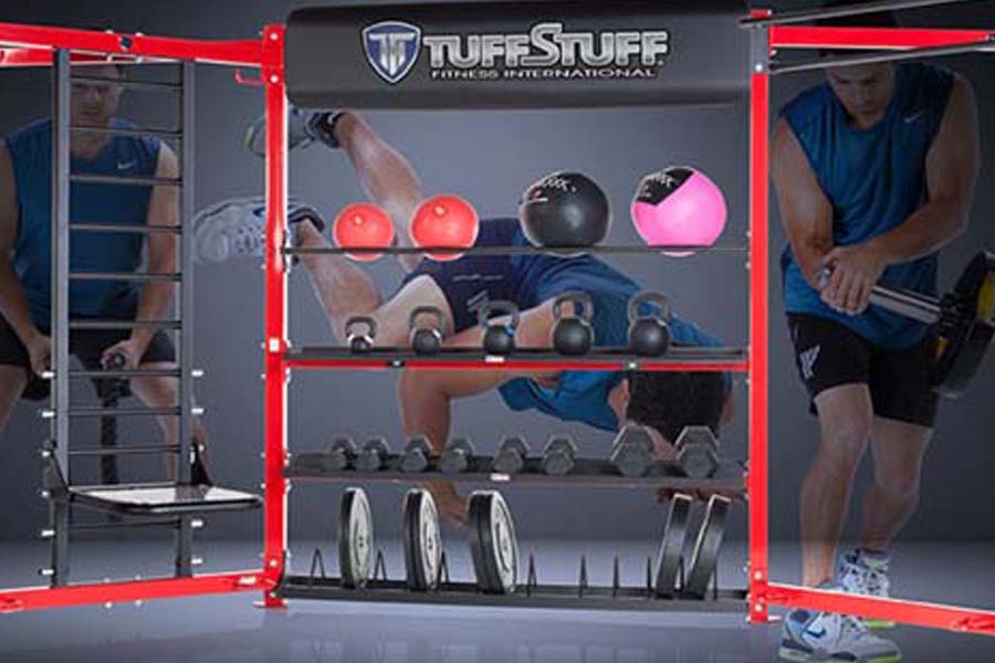 TuffStuff CT8 compact fitness training system with red frame displaying dumbbells, medicine balls, weight plates, and exercis