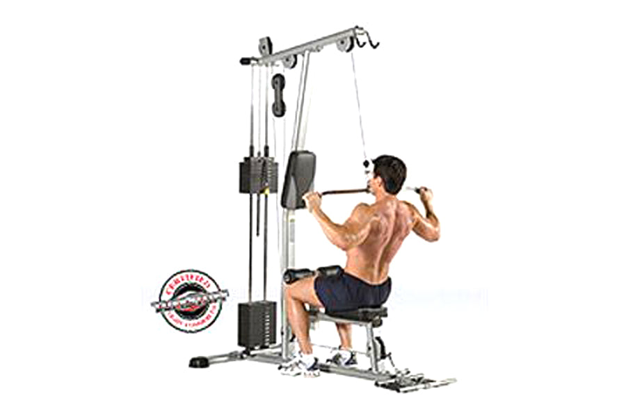 Silver and black cable machine with dual weight stacks, shown with male model demonstrating lat pulldown exercise on white ba