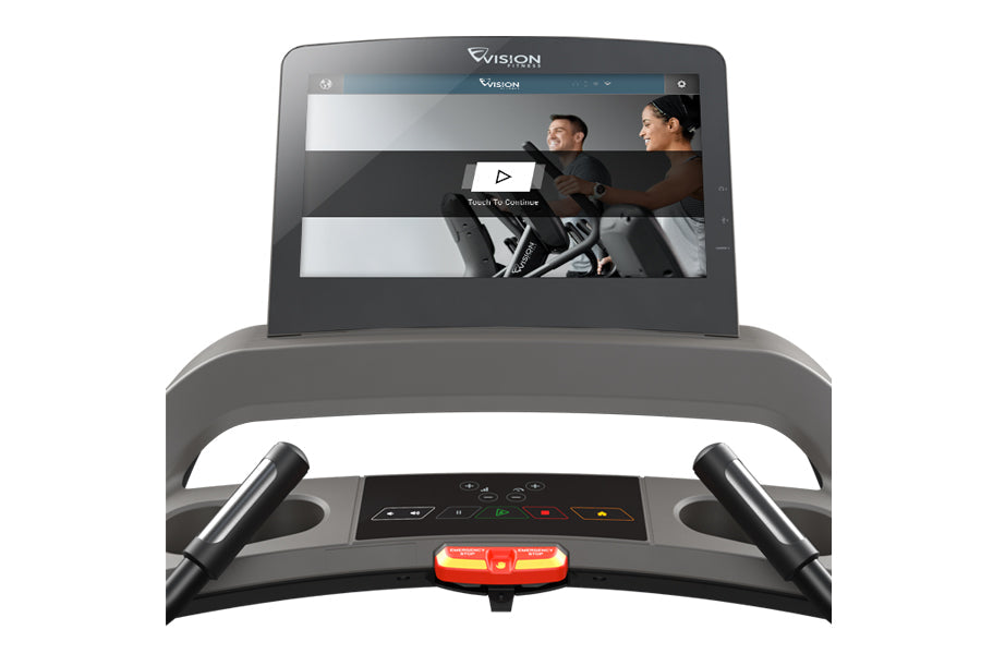 Vision T600E light commercial treadmill with touchscreen display showing workout video, black frame and gray accents