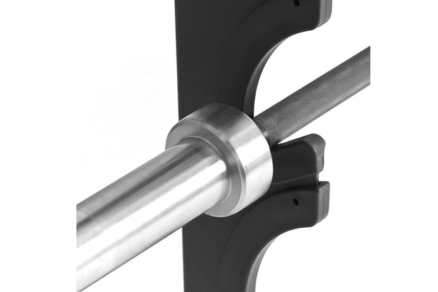 Warrior 8 Bar Gun Rack with polished steel rod and black plastic mounting brackets, close-up detail view