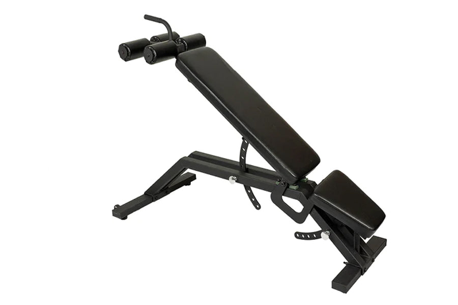 Black adjustable weight bench with decline position, padded backrest and seat, leg extension attachment, and anchored foot pl