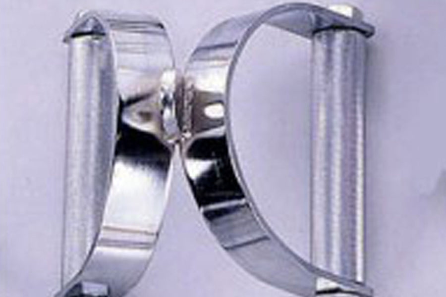 Polished chrome horseshoe-shaped dual purpose bar with curved handles and mounting brackets on lavender background