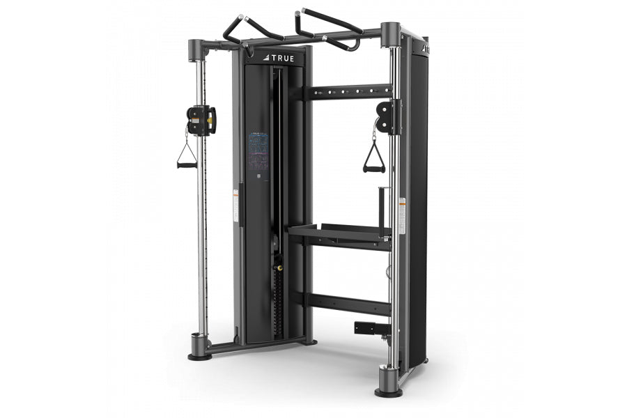 True XFT-900 functional trainer with black frame, dual weight stacks, cable attachments, and handlebar grips on white backgro