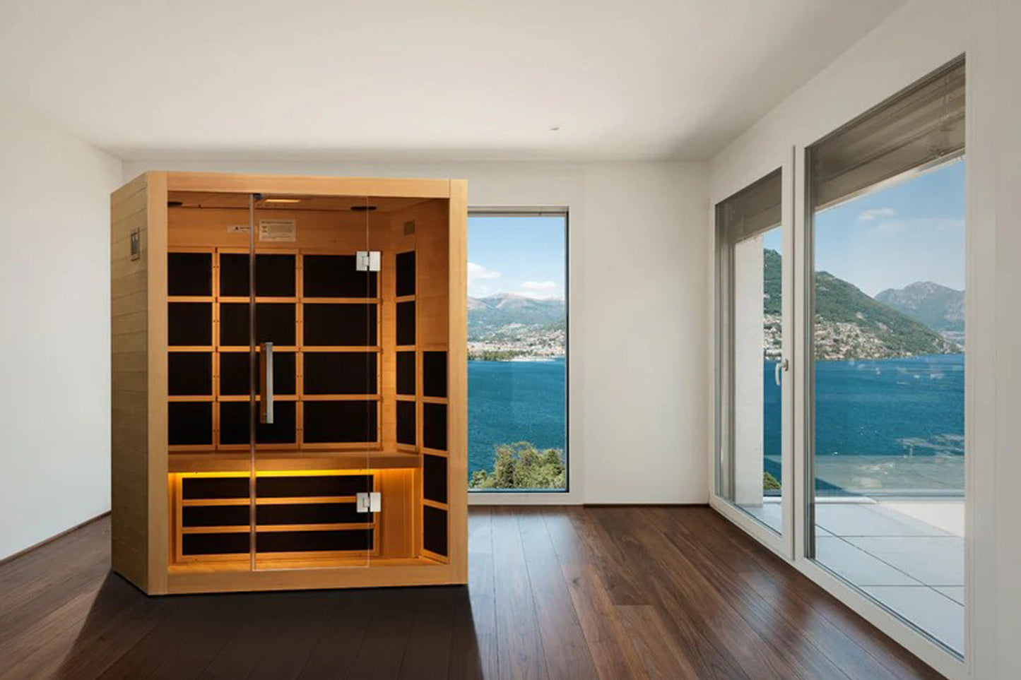 Almost Heaven Harmony infrared sauna with light wood exterior, glass front doors, and black interior panels in modern room wi