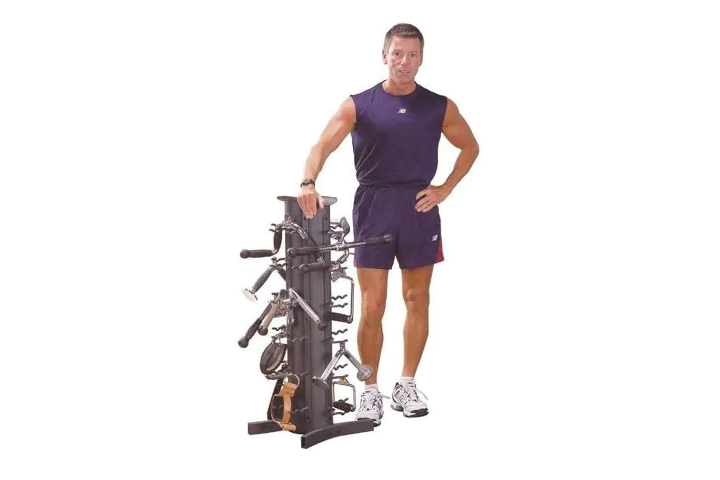 Man wearing navy sleeveless athletic tank top and shorts standing next to black vertical bike storage rack on white backgroun