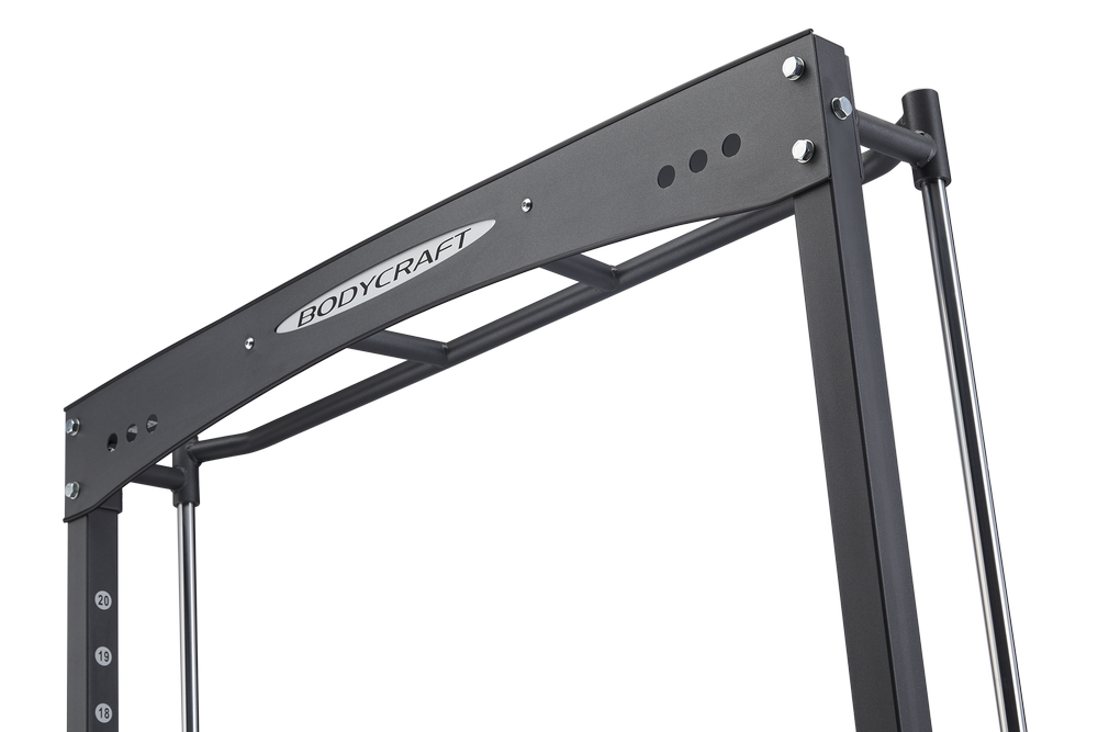 Black steel BodyCraft Jones Freedom Smith Machine with adjustable arms and weight pegs on white background