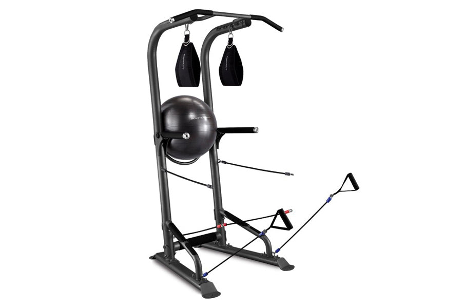 BodyCraft T3 Total Training Tower with black frame, hanging heavy bag, stability ball, and resistance bands on white backgrou