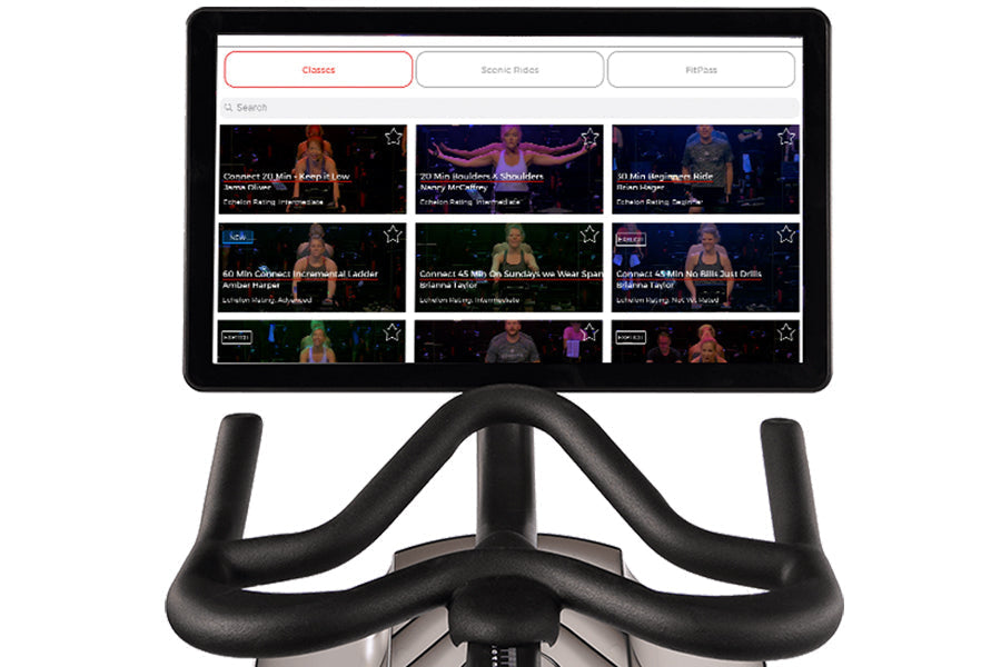 Echelon Smart Connect Bike EX-5s-22 with black handlebars and digital display screen showing fitness class interface