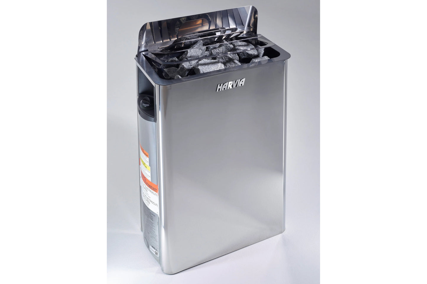 Harvia stainless steel sauna heater with open lid revealing black rocks inside, on white background