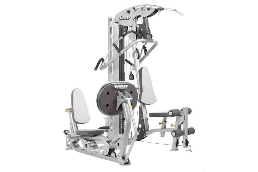 Hoist V-Express Home Gym with lat pulldown, leg press, leg extension, and cable pulley system on white background