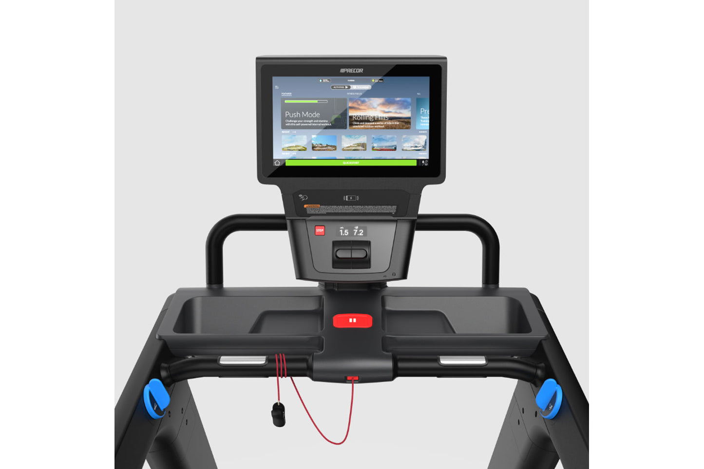 Black Precor treadmill with blue foot grips, integrated touchscreen display showing workout content, red emergency stop butto