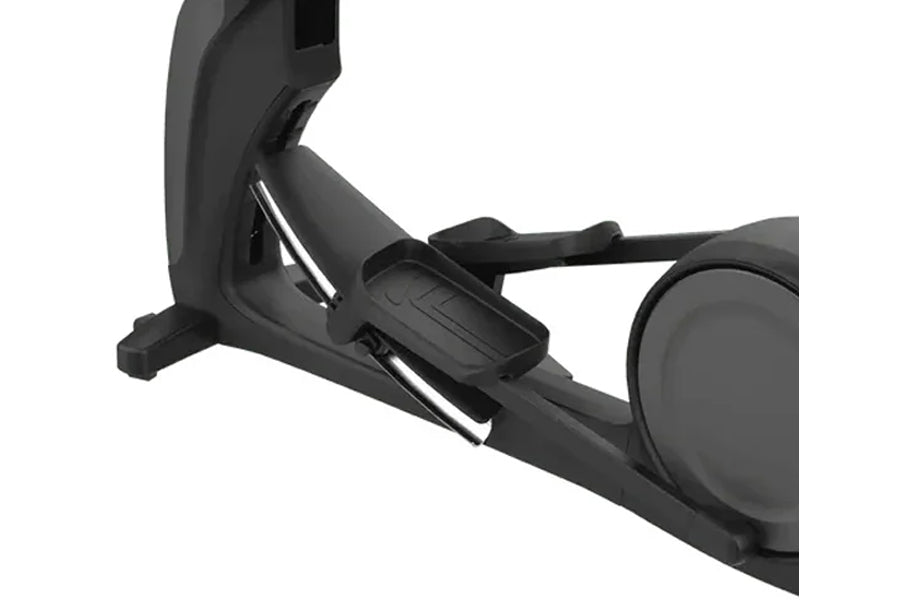 Black elliptical machine with extended footplate and circular wheel, shown from side angle on white background