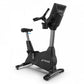 Black and gray TRUE CS400 upright stationary exercise bike with digital console and handlebars, on white background