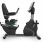 TRUE C900 recumbent exercise bike with black seat, gray accents, and digital console display on white background