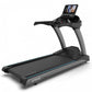 TRUE CS900 commercial treadmill with black running deck, gray frame, blue accent stripe, and digital display console on white