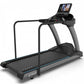 TRUE CS900 commercial treadmill with black belt, gray frame, handrails, and digital display screen on white background