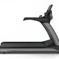 TRUE CS900 commercial treadmill with black frame, gray base, digital display, and black handrails on white background