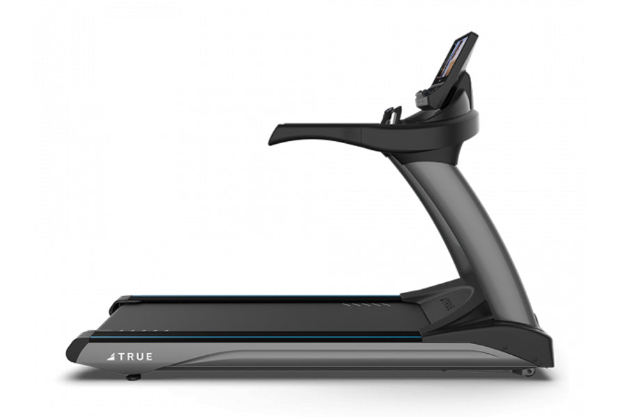 TRUE CS900 commercial treadmill with black frame, gray base, digital display, and black handrails on white background