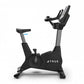 TRUE 900 upright exercise bike with black frame, gray accents, and digital display console on white background