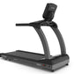 Black and gray True TR950 commercial treadmill with digital display and tablet holder on white background