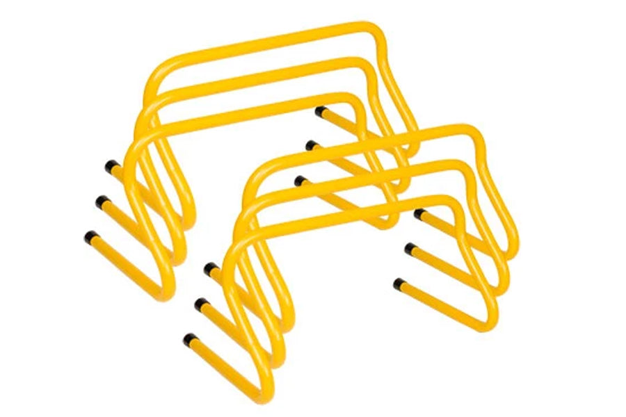 Set of 10 yellow weighted training hurdles with black foot pegs, arranged in rows on white background