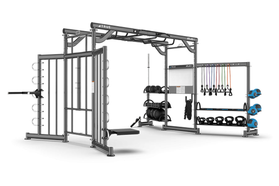 TRUE Atlas HD functional training rig with cable machine, weight storage, and suspension trainer attachments on white backgro