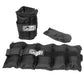 GoFit adjustable black ankle weights set with carrying pouch, flat lay on white background
