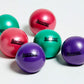 Five glossy Aeromat mini weight balls in teal, pink, red, and purple on white background