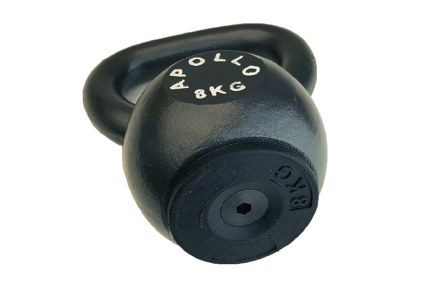 Black cast iron kettlebell with rubber base and handle, marked 4 pollo 8kg weight on white background