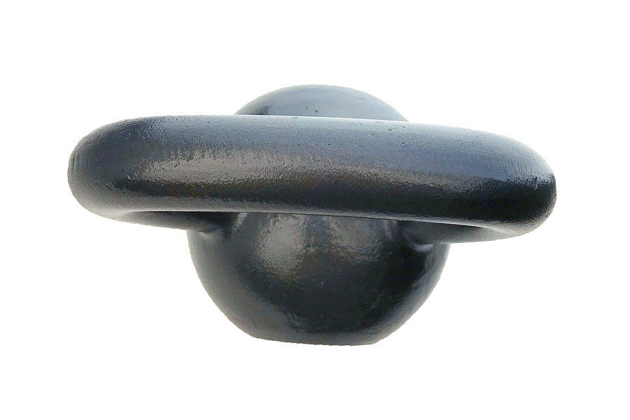 Dark gray cast iron kettlebell with elongated handle and rubber base on white background