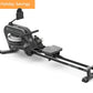 Black water rowing machine with digital monitor, footrest, and extended rail base on white background