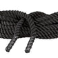 Black twisted battle rope with thick braided nylon construction and reinforced handles, shown coiled on white background