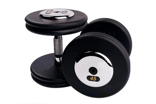 Pair of black pro style dumbbells with white and gold weight indicator showing 45 pounds, chrome handle and base on white bac