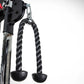 BodyCraft HFT functional trainer cable machine with black twisted rope handles and round rubber grip attachments on white bac