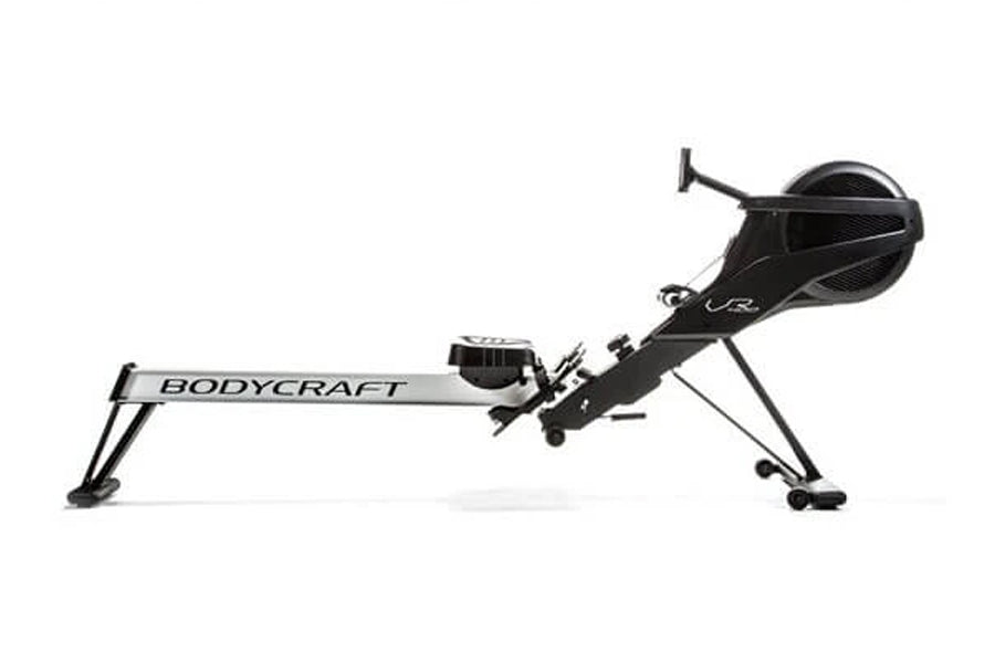 BodyCraft VR400 Pro rowing machine with black seat, footrest, and flywheel on white background
