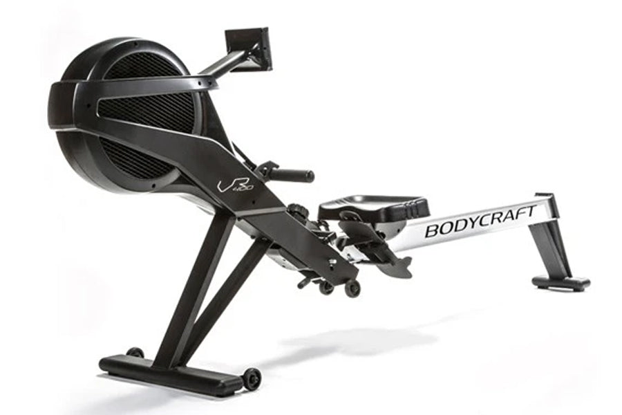 BodyCraft VR400 Pro rowing machine with black frame, fan resistance wheel, and extended seat rail on white background