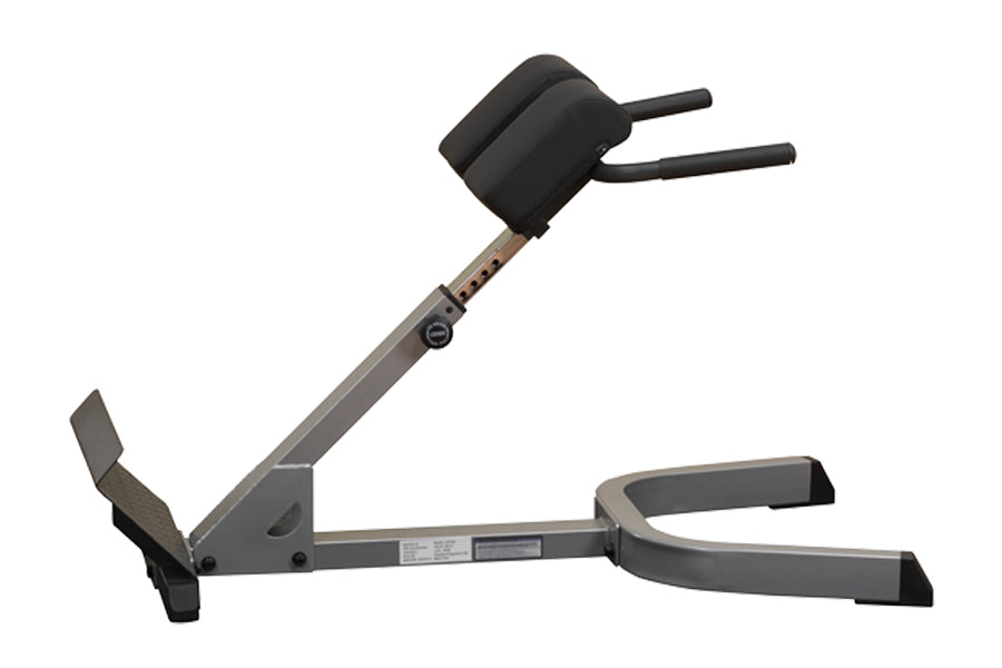 Body-Solid 45-degree ab and back hyperextension bench with gray metal frame and black foam padding on white background