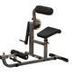 Body-Solid Ab & Back Machine with gray steel frame, black padded seat and back support, adjustable resistance dial, on white 